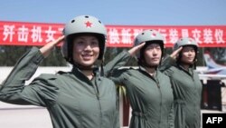 Қытай армиясында қызмет ететін әйел сарбаздар. Көрнекі сурет.