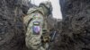 Військовослужбовець ЗСУ в окопі на бойових позиціях біля лінії розмежування неподалік від містечка Нью-Йорк Донецької області, 9 лютого 2022 року, фото ілюстративне
