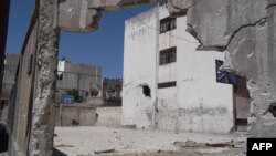 A handout picture released by the Syrian opposition's Shaam News Network allegedly shows the destruction in Homs