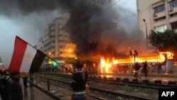 Tym e flakë nga demonstratat në qytetin egjiptian Aleksandri