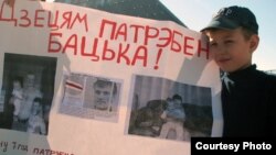 Syarhey Kavalenka's son pickets in Vitebsk in May 2012 for his father's freedom.