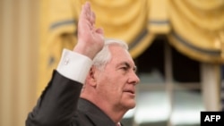 Rex Tillerson is sworn in as U.S. Secretary of State in the Oval Office at the White House in Washington on February 1.