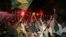 Pakistani soccer fans celebrate a Brazilian World Cup victory over Australia in Karachi in 2006.