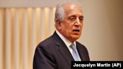 U.S. envoy Zalmay Khalilzad prepares to speak on the prospects for peace at the U.S. Institute of Peace in Washington on February 8.