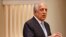 U.S. envoy Zalmay Khalilzad speaks in Washington on February 8.
