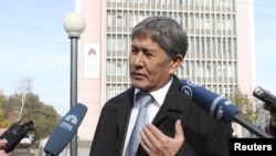 Almazbek Atambaev, who is set to become the next president of Kyrgyzstan, talks to journalists in Bishkek on October 31.