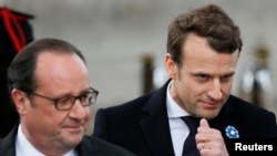 Fransanın indiki prezidenti Francois Hollande (solda) və Emmanuel Macron