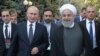 Russian President Vladimir Putin and Iranian President Hassan Rouhani arrive for a meeting on the sidelines of a session of the Supreme Eurasian Economic Council In Yerevan, Armenia October 1, 2019.