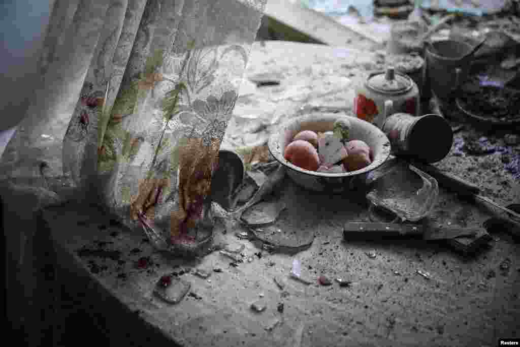 Sergei Ilnitsky, a Russian photographer of the European Pressphoto Agency, won First Prize in the General News Category, Singles, for this image of&nbsp;damaged goods lying in a kitchen in downtown Donetsk, in war-torn eastern Ukraine.