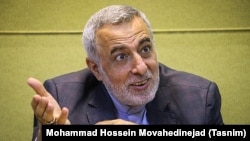 Former Iranian diplomat Hossein Sheikholeslam speaks to reporters in July 2016.