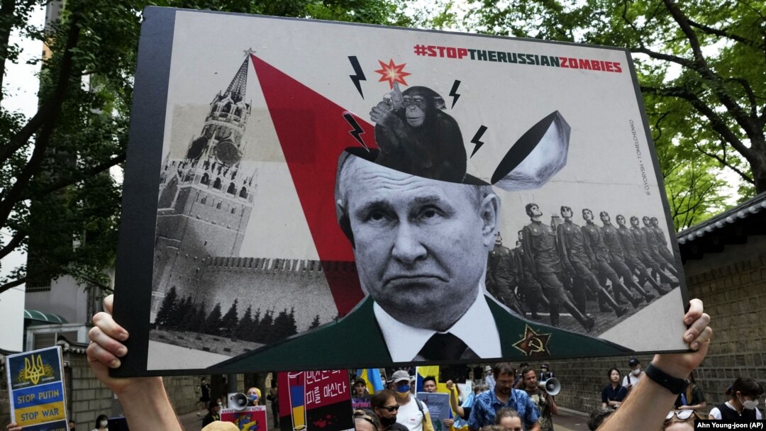 People march during a rally against Russia's invasion of Ukraine near the Russian Embassy in Seoul in July.