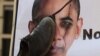 A protester hits a portrait of U.S. President Barack Obama with a shoe -- a gesture of insult in the Arab world -- in front of the U.S. Embassy in Cairo last spring.