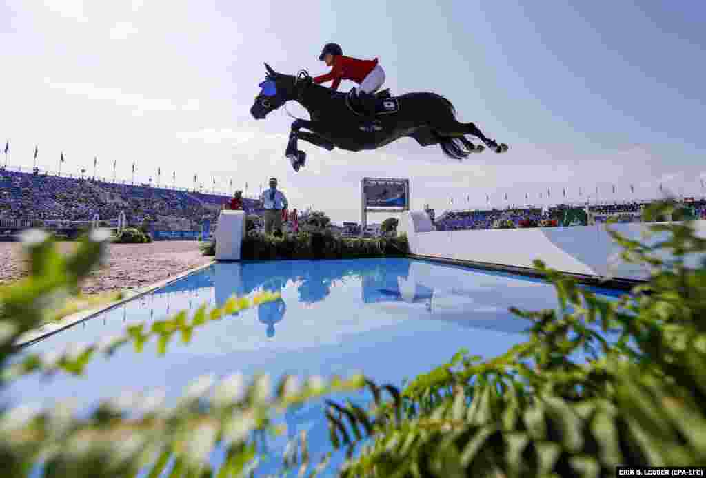 Karen Polle of Japan competes at the World Equestrian Games in North Carolina on September 20. (epa-EFE/Erik S. Lesser)