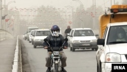 Pollution in Tehran. Many people wear masks outdoors. December 18, 2017