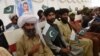 FILE: Baloch separatist fighters attend a ceremony in Quetta, the provincial capital of Balochistan after surrendering to the authorities in September 2018