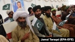 FILE: Baloch separatist fighters attend a ceremony in Quetta, the provincial capital of Balochistan after surrendering to the authorities in September 2018