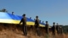 На Хортиці ветерани бойових дій на Донбасі урочисто підняли національний прапор