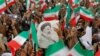 Supporters of Iranian conservative presidential candidate Ebrahim Raisi cheer during an election camping rally in Tehran, Iran, 16 May 2017.