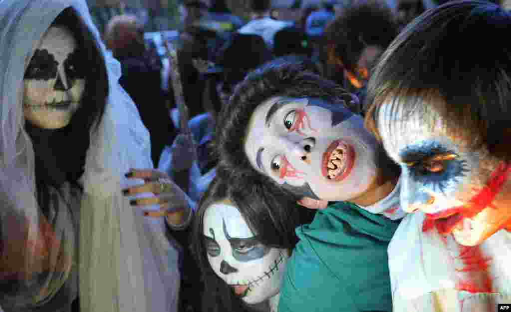 Kyrgyz students dressed as zombies participate in an annual Halloween party in central Bishkek on October 31. (AFP/Vyacheslav Oseledko)