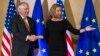 U.S. Secretary of State Rex Tillerson (left) meets with EU foreign policy chief Federica Mogherini in Brussels on December 5.