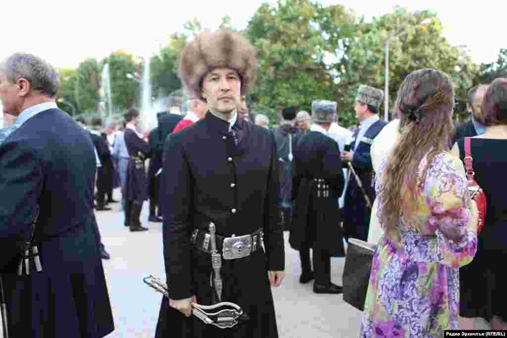 A man wears a Tatar uniform during the celebration in Makhachkala.