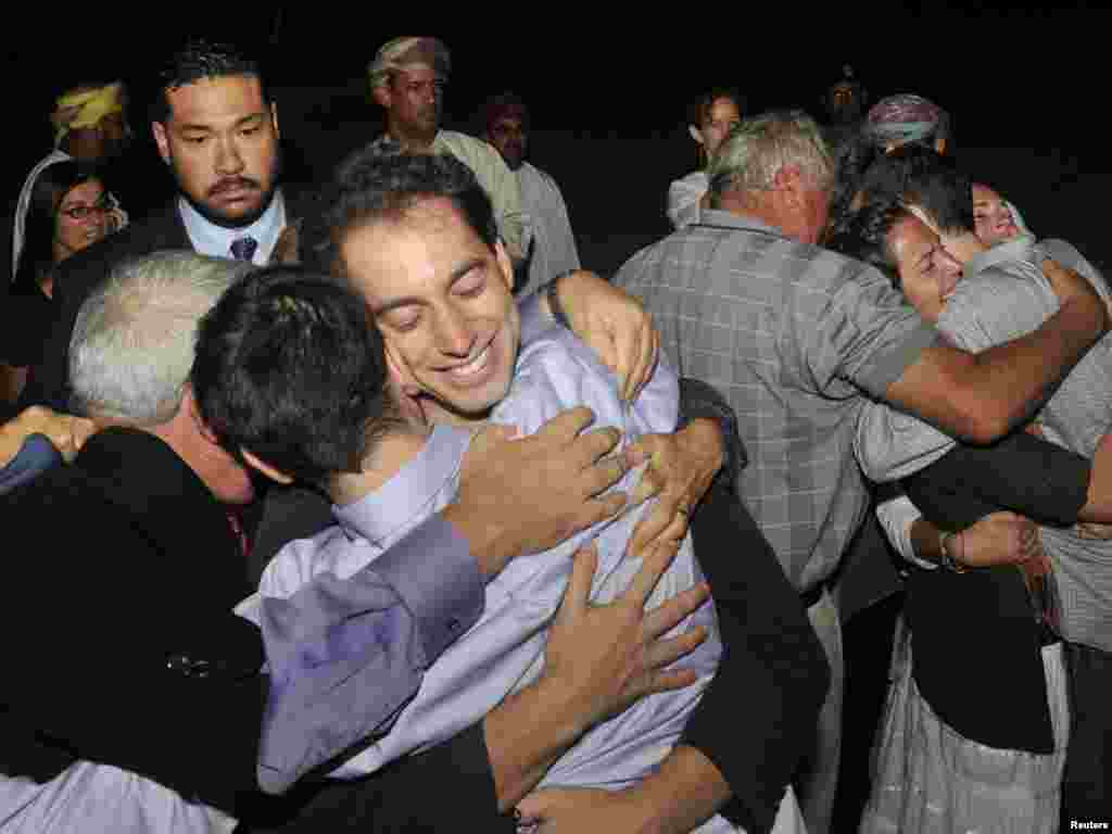 U.S. citizens Josh Fattal and Shane Bauer, who were held in Iran on charges of espionage, are greeted by their families upon arriving in Oman after being released on $1 million bail. (Photo taken by Sultan Al Hasani for Reuters)