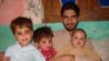 Rasool Dawar with his children.