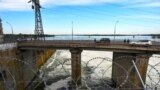 Автомобільний міст біля Каховської ГЕС. Неподалік Нової Каховки на Херсонщині, 20 травня 2022 року