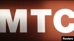Russia -- A board displays the logo of Russian mobile phone operator MTS is seen in Moscow, 25Feb2012