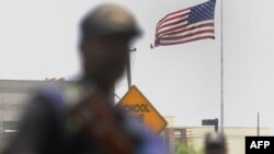 Pakistani police commandos stand guard near the US consulate in Karachi after bin Laden's killing