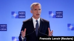 NATO Secretary-General Jens Stoltenberg addresses a news conference during a NATO defense ministers meeting in Brussels on June 7.