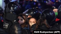 Police detain protesters in downtown Moscow on February 2.