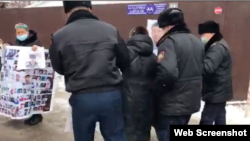 Police breaking up the protest at the Chinese Consulate in Almaty on March 15