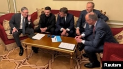 British Prime Minister Keir Starmer, Ukrainian President Volodymyr Zelenskyy, French President Emmanuel Macron, German Chancellor Friedrich Merz, and Polish Prime Minister Donald Tusk speak with US President Donald Trump by phone.
