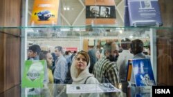 Iran -- People walk at 29th Tehran International Book Fair in "Aftab shahr" South of Tehran, 06May2016