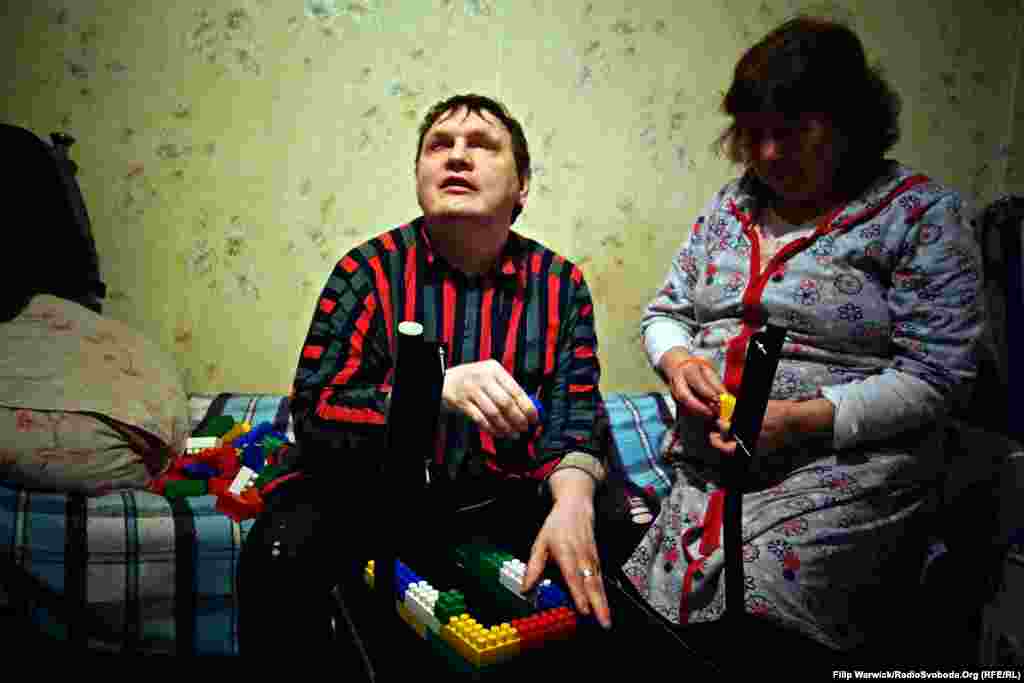 Neli Sergeyevna cares for her blind and mentally disabled son Igor. They survive on food vouchers from the World Food Program.