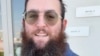 Zvi Kogan, an Israeli rabbi, stands outside a supermarket, in Dubai