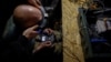 Ukrainian service members operate an FPV drones during the unilaterally proposed three-day ceasefire declared by Russia, near a frontline in Dnipropetrovsk region