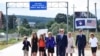 Kosovo -- US Vice President Joe Biden (C) joined by his wife Dr Jill Biden and other family members walk on a national road named after their late son Joseph "Beau" Biden, near the village of Sojevo, August 17, 2016