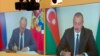 Rusiya prezidenti V.Putin və Azərbaycan prezidenti İ.Əliyev 10 noyabr atəşkəş bəyanatını imzalayırlar.