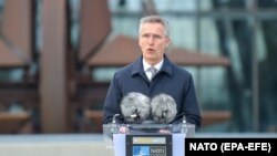 NATO Secretary-General Jens Stoltenberg speaks during a flag-raising ceremony to mark the accession of North Macedonia to NATO at NATO headquarters in Brussels on March 30.