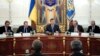Ukrainian President Viktor Yanukovych (center) at a meeting in Kyiv on November 5 to sign the Chevron deal.