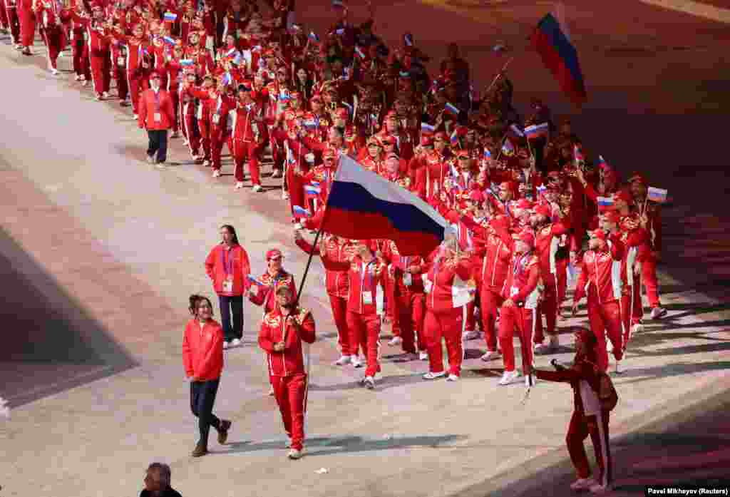 The Russian team parades through the Bishkek Arena.A notable absence from the politicians' terrace during the opening ceremony was Chinese leader Xi Jinping, who is in Bishkek for the political summit but did not appear at the games.
