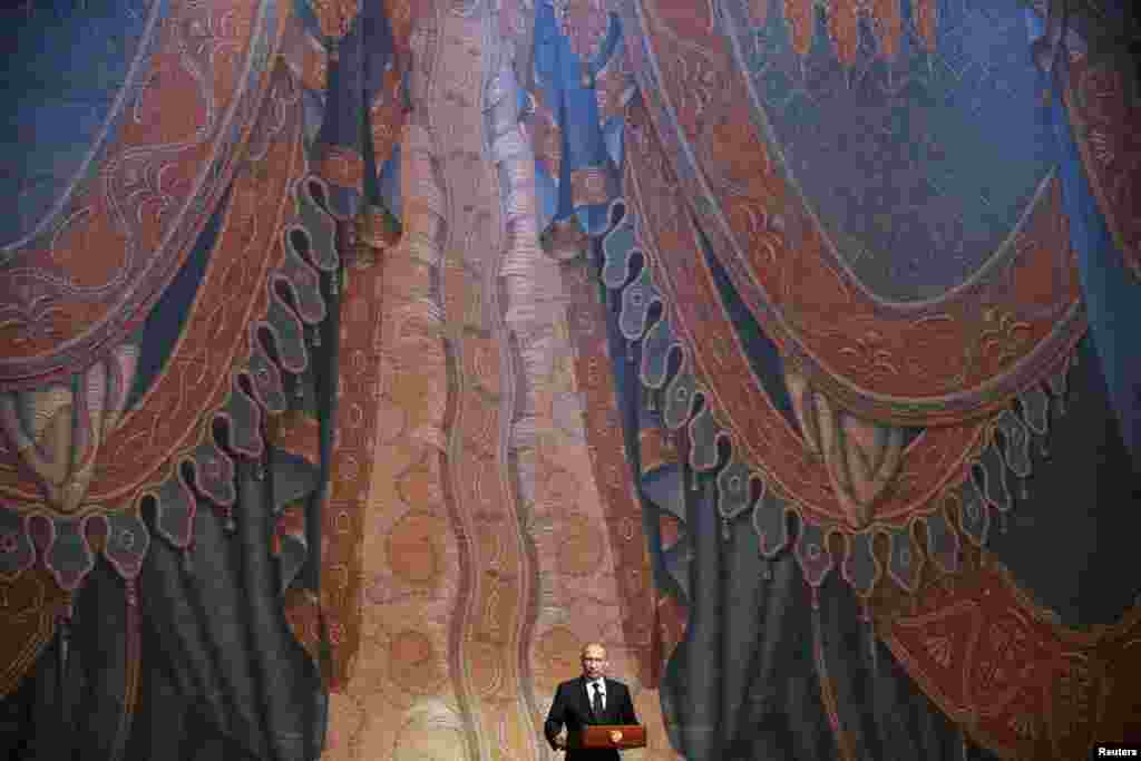 Russian President Vladimir Putin delivers a speech during the grand gala concert that marked the opening of the new Mariinsky Theater in St. Petersburg. (Reuters/Anatoly Maltsev)