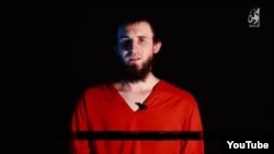 Islamic State says it has beheaded the man identified as Magomed Khasayev. The extremist group claimed Khasayev was a Russian spy. 