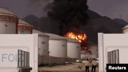 Flames rise in the Fujairah oil industry zone from debris of an intercepted Iranian drone earlier this month.