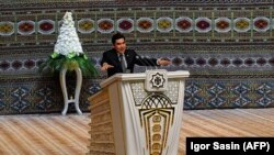 Turkmen President Gurbanguly Berdymukhammedov addresses participants at a meeting of the Council of the Elders outside Ashgabat on October 9.