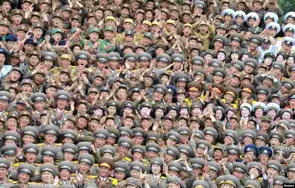 North Korean war veterans and commanding officers take part in a military parade held to celebrate the 60th anniversary of the signing of the truce of the Korean War. (Reuters/KCNA)