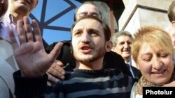 Armenia - Opposition activist Tigran Arakelian is greeted by supporters after being released from prison, Yerevan, 14Oct2013.
