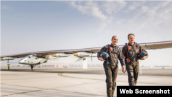 Швейцарські пілоти Андре Боршберґ і Бертран Пікар з «Solar Impulse 2»